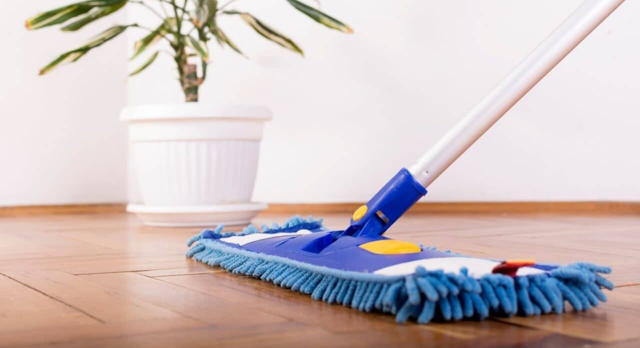 a mop cleaning LVP flooring