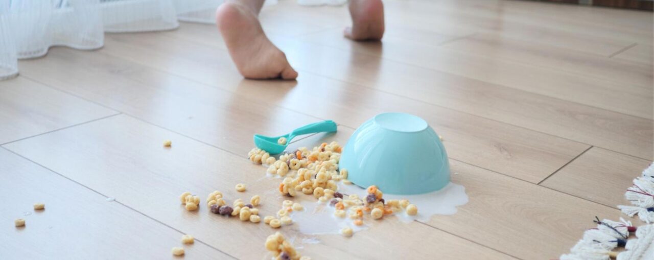 a bowl of cereal spilt on LVP flooring