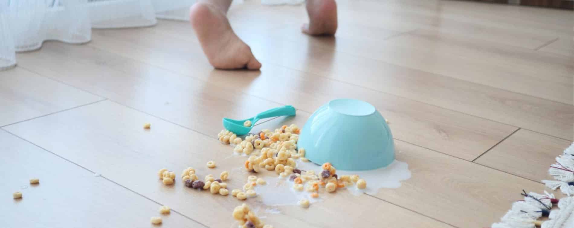 a bowl of cereal spilt on LVP flooring